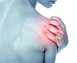 Acute pain in a shoulder at the young women.
